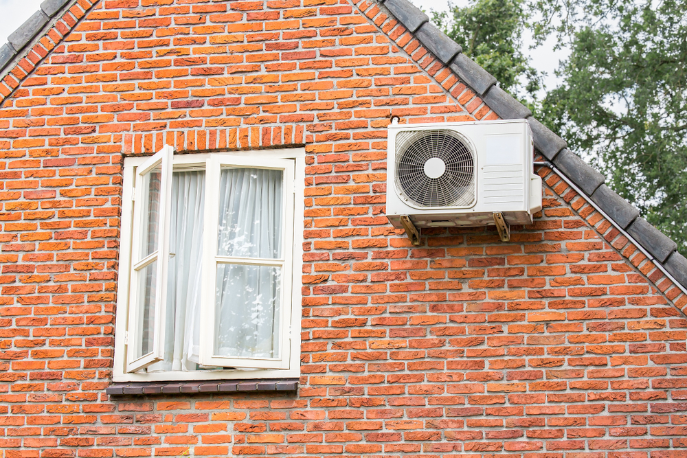 Airco buitenunit wegwerken